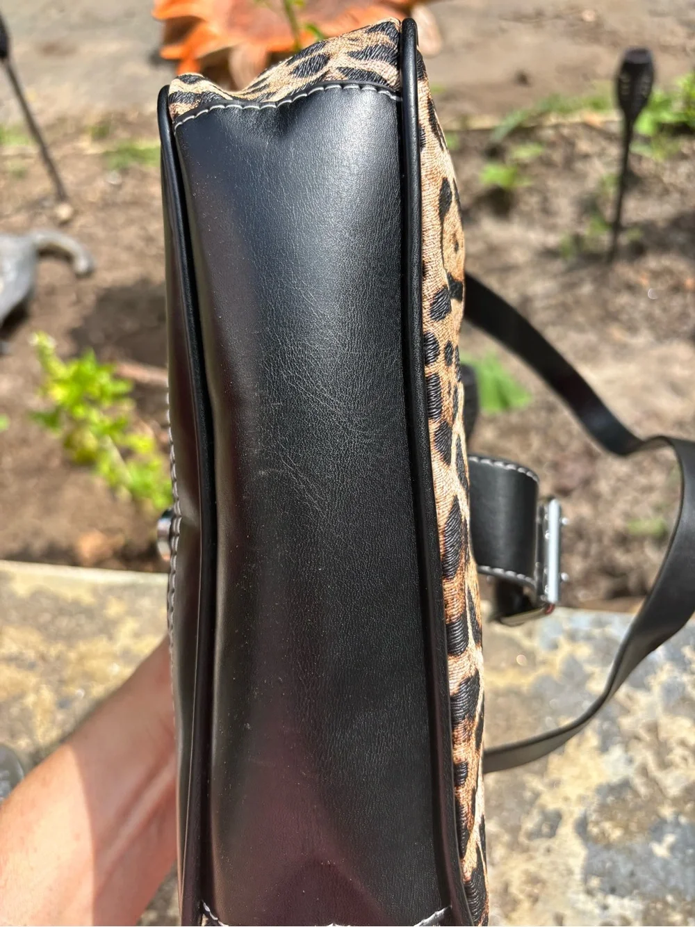 Leopard Print Shoulder Bag with Black Trim and Buckle Accent